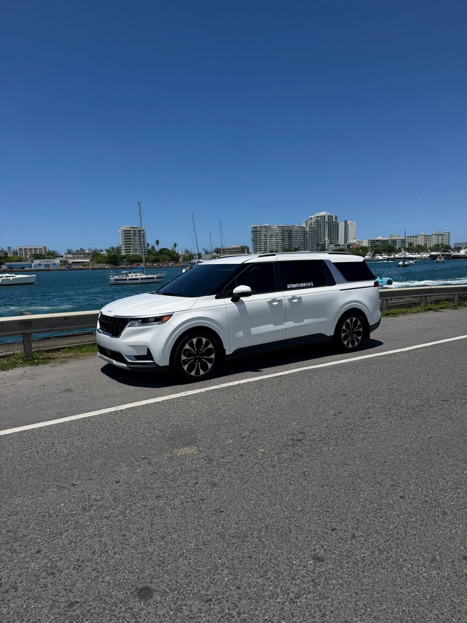 Island Ride PR LLC Kia Carnival near the San Juan waterfront for cruise port transfers